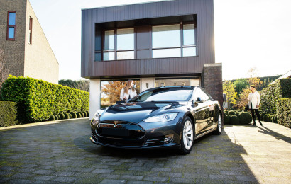 an electric car parked in the driveway