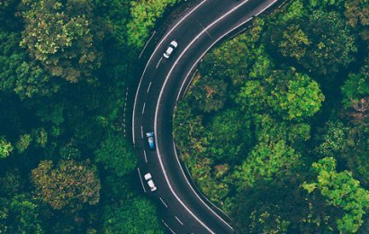 cars driving in scenic road